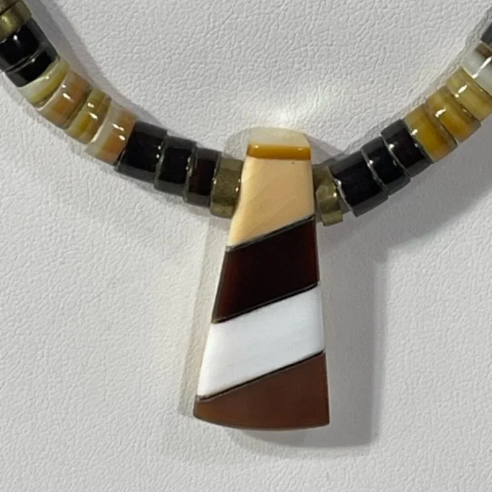 Vintage stone and inlay heishi necklace. Shell, onyx and jasper.